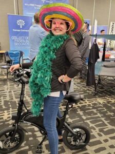 Blog - HUG Attendee Amanda Tries Out the Electric Bike at Canopy Connect's Booth