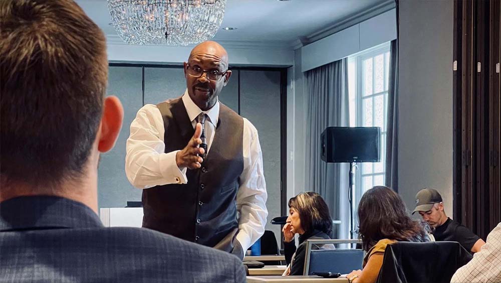 Blog - Professional Man Talking and Communicating with the Audience at the 2021 HUG National Conference